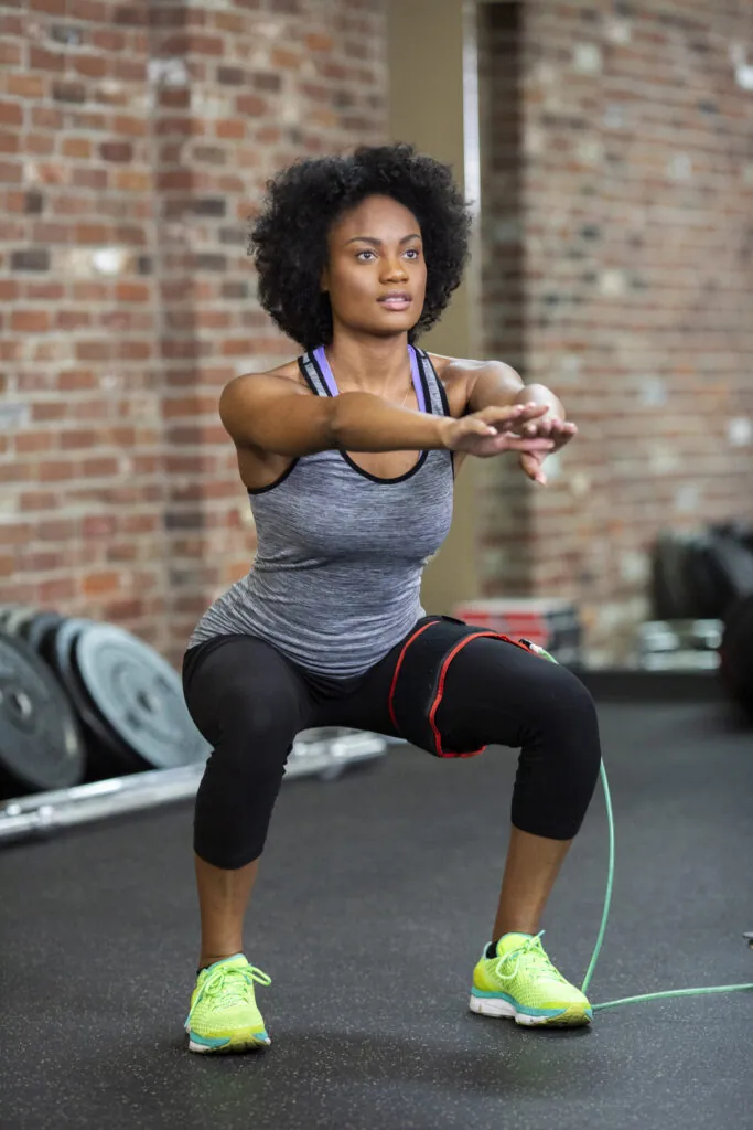 collage athlete utilizing blood flow restriction training