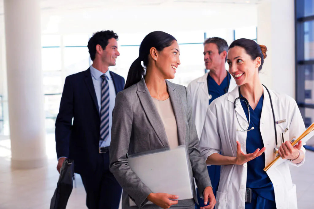 doctors and physical therapists talking
