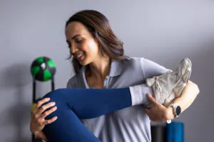Physical Therapist working with patient